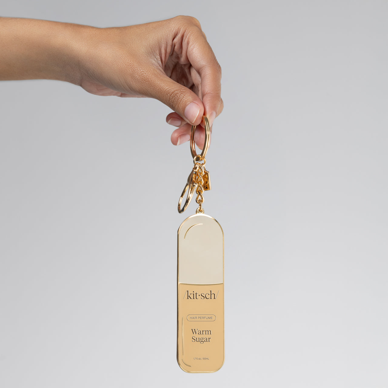 508825-KitschMetalEnamelKeychain-WarmSugar-Model-1280x1280px.jpg